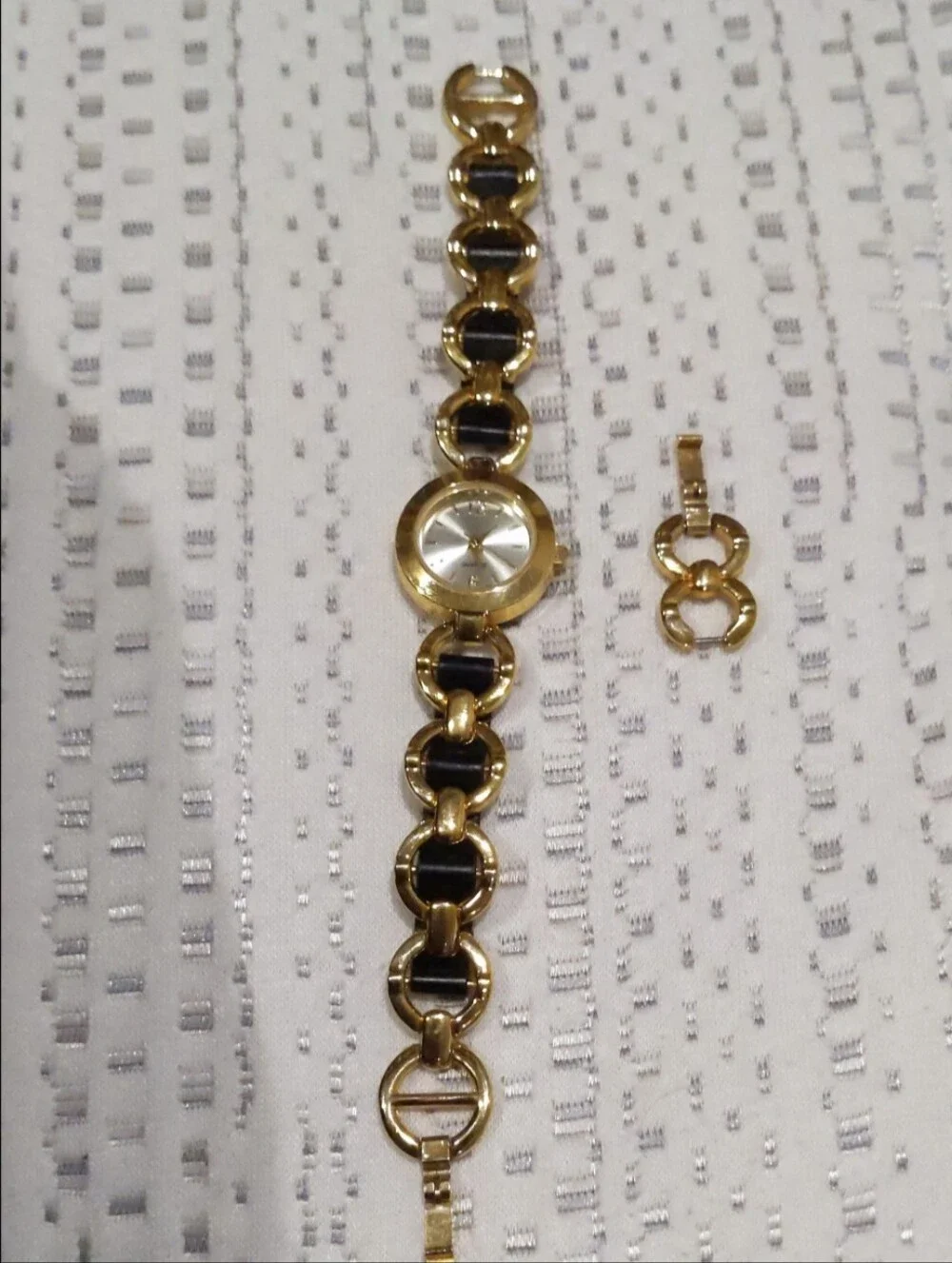 Gold-Tone Link Bracelet Watch in Gold and Black With Extensions